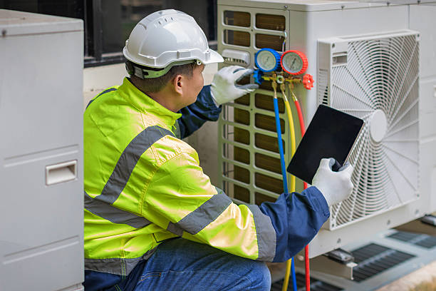 Professional Heat Pump Repair technician working in Patterson, CA